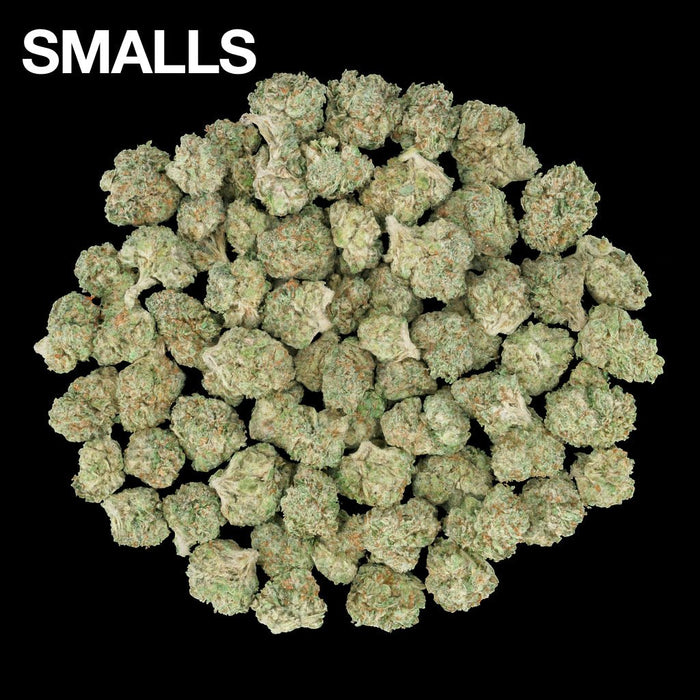 Small THCA flower buds on a black background